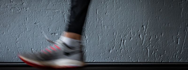 Blurry artistic shot of a person moving during exercise session